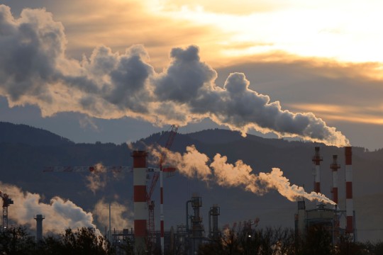 Smoke rises from the Butachimie plant in Chalempe, eastern France, Tuesday, Nov.8, 2022. Just back from the U.N. climate summit in Egypt, French President Emmanuel Macron is to meet Tuesday with the heads of the country's most climate-damaging industries to pressure them to reduce greenhouse gases emissions, amid growing competition from the U.S. and China. (AP Photo/Jean-Francois Badias)