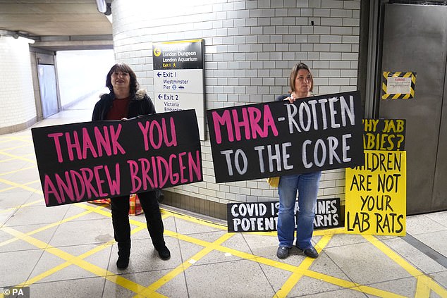 Anti-vax protesters showing support for Andrew Bridgen at Westminster underground station in London today