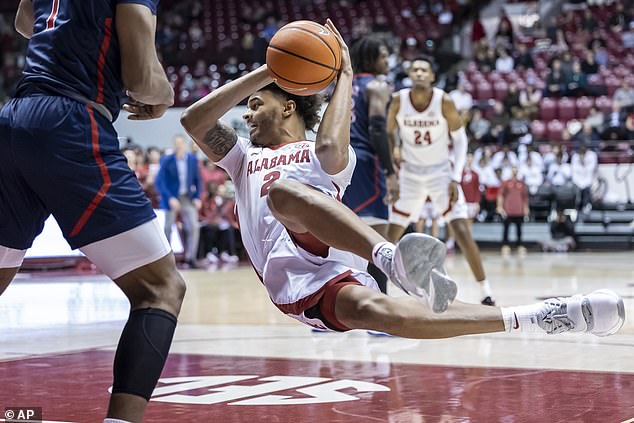 Miles falls to the floor during a recent game for Alabama, against Jackson State in December