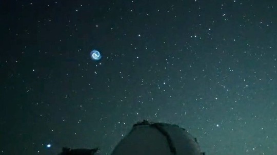 SpaceX rocket creates eerie blue spiral in night sky over Hawaii