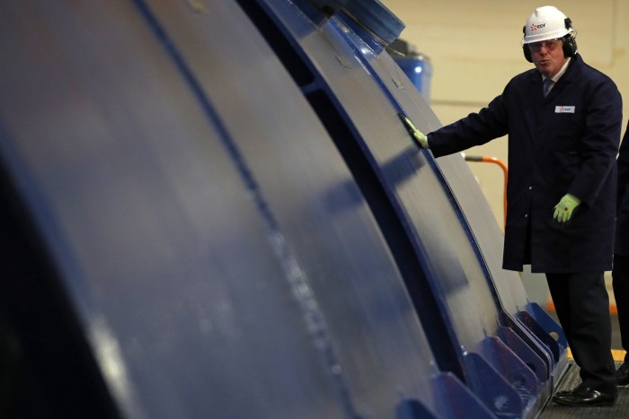  Boris Johnson touches a generator during his visit to EDF’s Sizewell B Nuclear power station