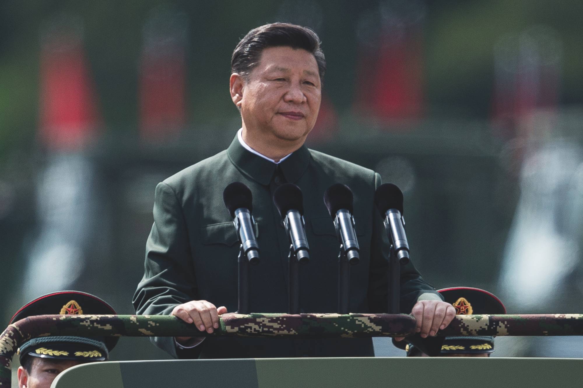 China's President Xi Jinping inspecting People's Liberation Army soldiers