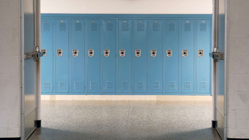 PHOTO: Empty school hallway.