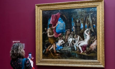 A visitor with Diana and Actaeon by Titian at the National Gallery in London, March 2020