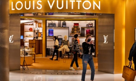 Shoppers at Louis Vuitton in Hong Kong.