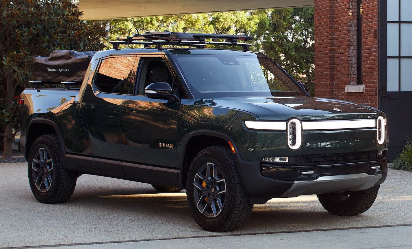 Green 2022 Rivian R1T parked outdoor. 