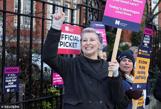 Nurses strike on a picket line outside the Royal Marsden Hospital in London on February 6