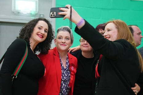 Labour’s Ashley Dalton (in red) posing for a selfie with supporters early this morning after winning the West Lancashire byelection.