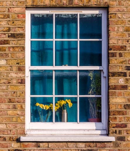 A window with curtains closed