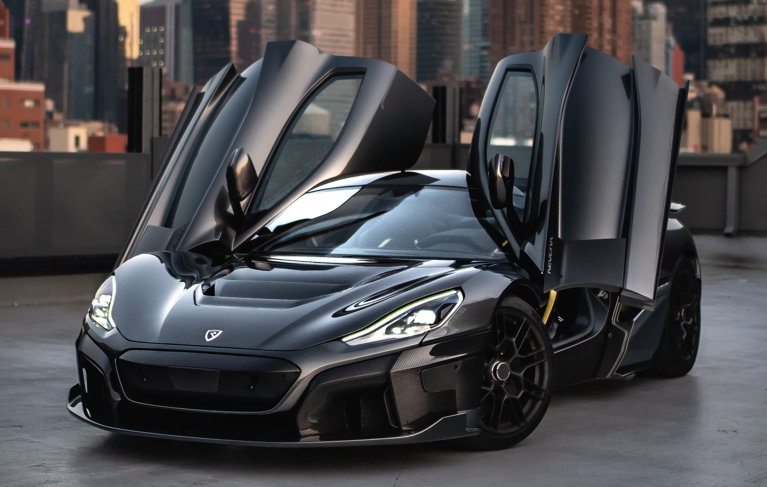 Black 2022 Rimac Nevera parked outdoor. 