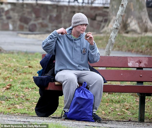 PHILADELPHIA: Seemingly using a mirror to direct themselves, one person casually shoots up, injecting a needle into their neck during the daytime