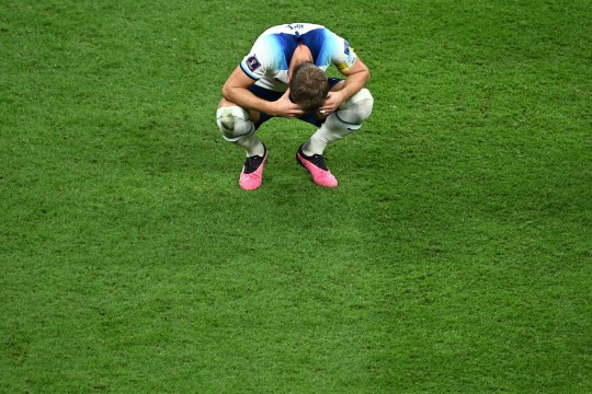 Kane reacts to his team's loss in the Qatar 2022 World Cup quarter final