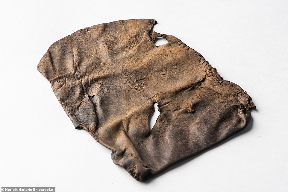 Leather pouch with crown symbols taken from the wreck. The ship itself is fragmented and still on the seafloor, and authorities say there are currently no plans to bring any part of the remains to land