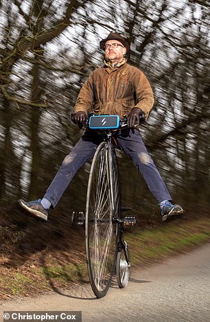 Penny farther: Toby Walne takes the converted Penny Farthing for a spin