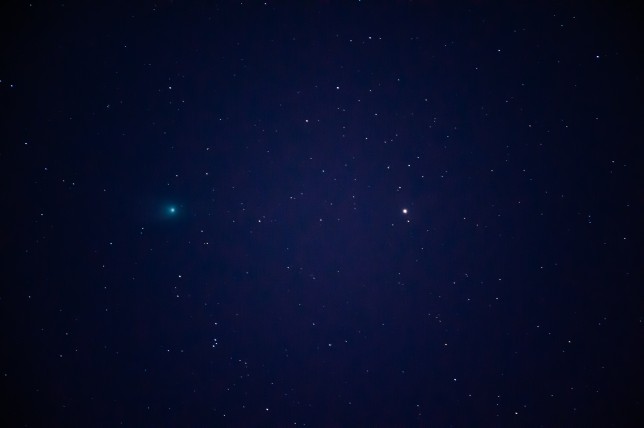 Comet C/2022 E3 (ZTF) (the green dot on the left) in the sky of Molfetta before sunrise around 6am on January 24, 2023 (Picture: Getty)