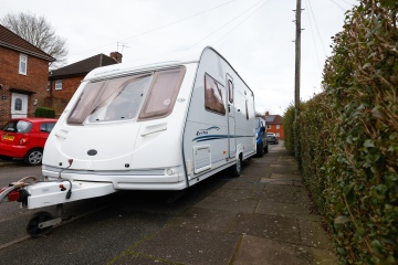 My neighbours hate my caravan blocking the street - I've been doing it for years