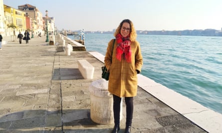 Mylène Ebrard stands on a sunny canalside