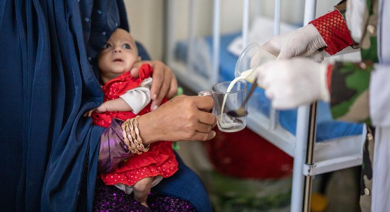 A 5-month-old girl at Paktia Regional Hospital in Gardez, Afghanistan, receives therapeutic milk to treat malnutrition. 