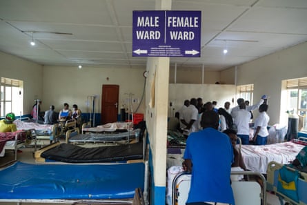A sign divides a cancer ward at Mbarara hospital into male and female patient areas