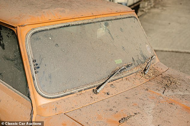 Given that it hasn't been started up since 1990, the car will likely be pushed into the auction room rather than under its own power. A driver wouldn't be able to see through the dust-coated windscreen