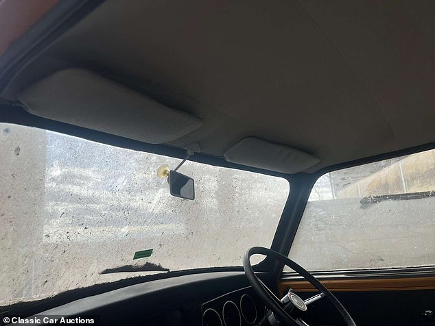 Another interior shot shows just how much dust is covering the outside of the car having been left standing in the storage unit for 33 years