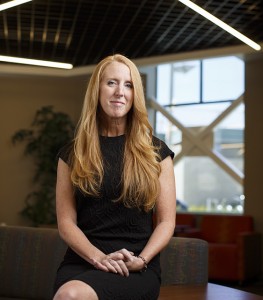 image of Kristen Walker sitting with hands on lap