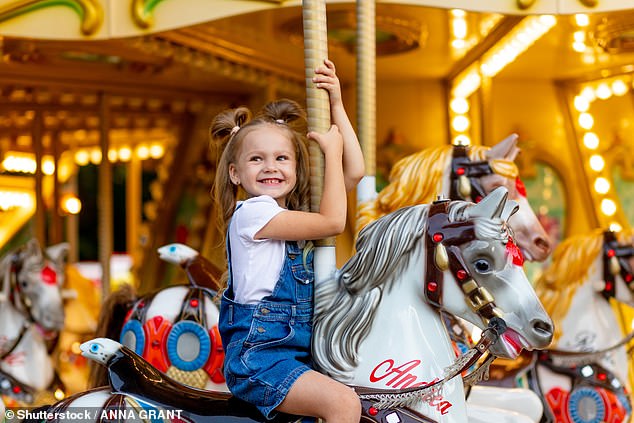 There's nothing quite as thrilling to a child as taking a ride on a fast-moving carousel (stock image)