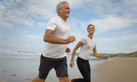 Couple running on beach