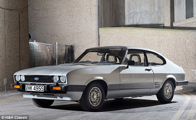 Capri craze: This 1978 Capri 3.0 S that featured in cult TV show The Professionals sold at the auction for a world-record fee of £55,000 on Wednesday