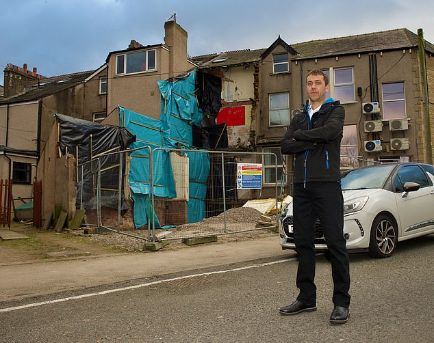 Distress: Craig Hyde lives next to this neglected Home REIT property