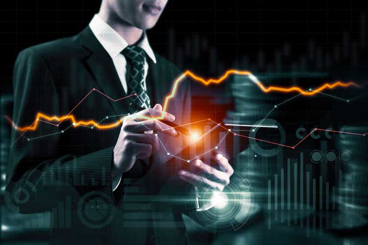 Businessman working with digital finance business graph of perceptive technology