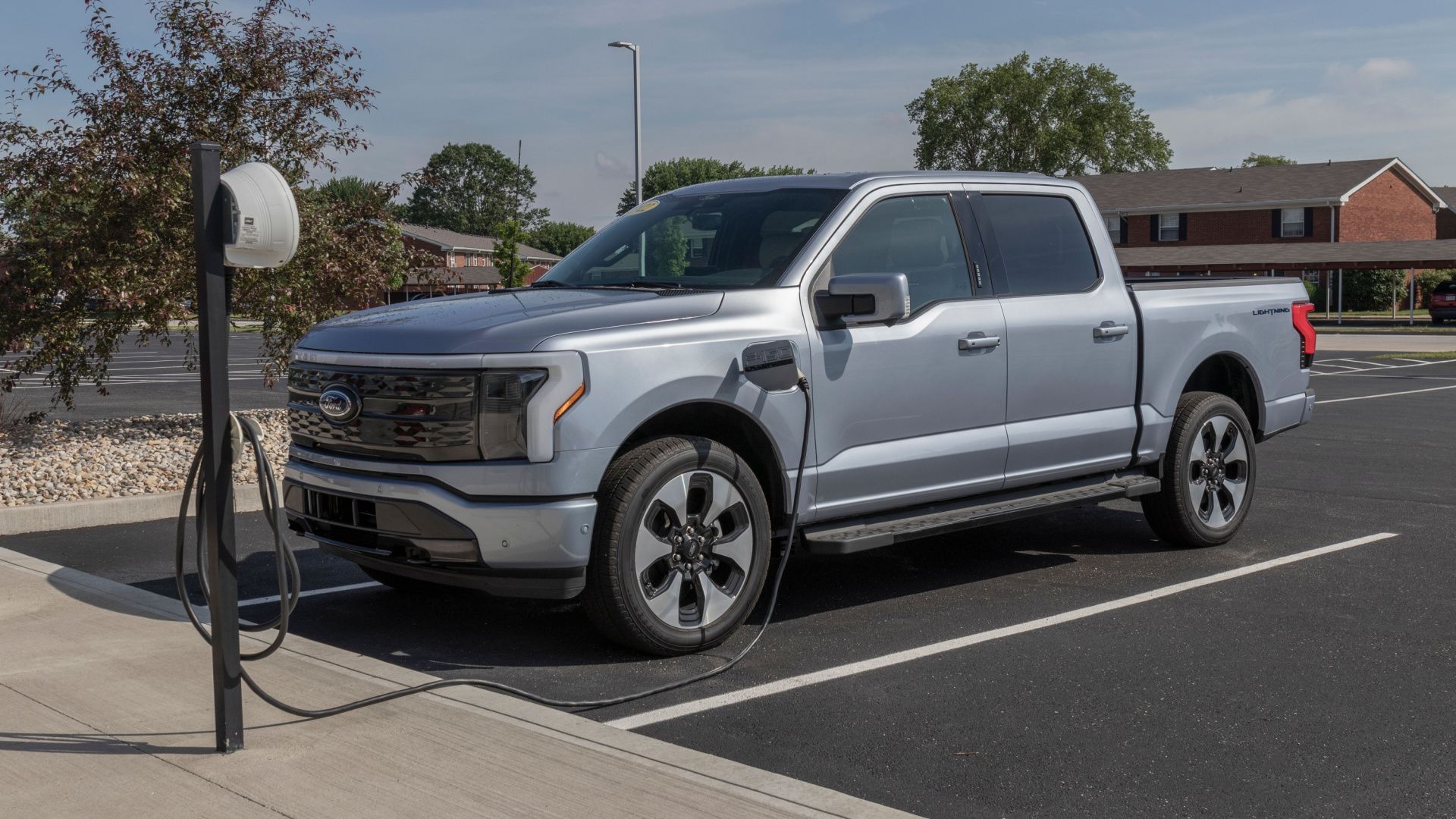 Silver-blue 2023 Ford F-150 Lightning Charging