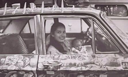 Belinda Crimmins in her car decorated with images of food, recipes and Tupperware