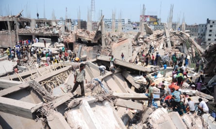 Civilian volunteers assist in rescue efforts after the collapse of the Rana Plaza garment building on the outskirts of Dhaka in 2013.