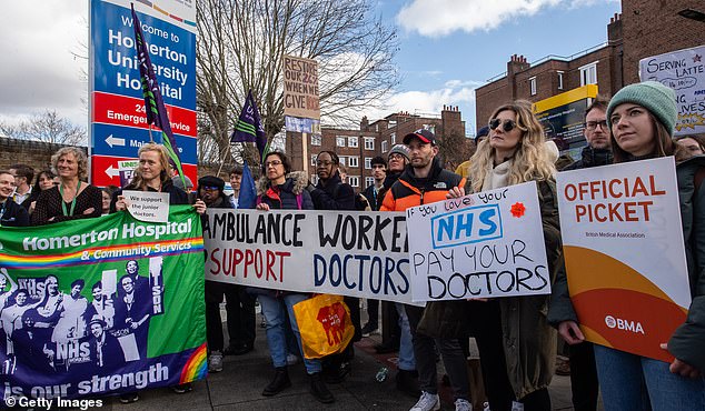 Medical chiefs warn junior doctor walkout from Thursday could 'overwhelm' A&E services. Junior doctors are here pictured on strike in London on March 14, 2023