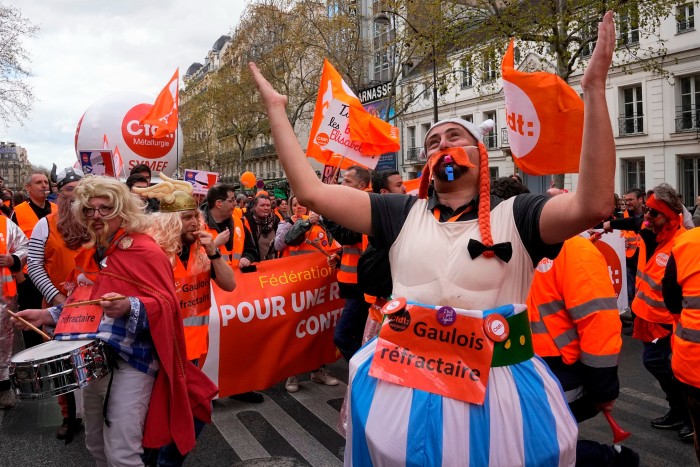 Unionists dressed as French Gaulish comic characters demonstrate