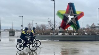 Two cops on bikes outside the Mall of America.