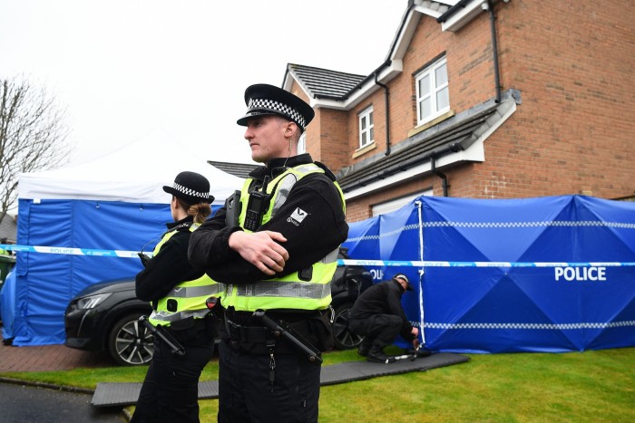 Police officers on duty outside the home of Peter Murrell and Nicola Sturgeon