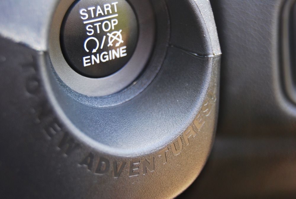 Image showing the 'ignition barrel' and starter button on a Jeep Renegade with the script 