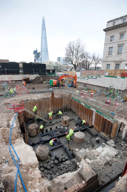 Excavation of the wall taking place in the foreground, with the Shard in Southwark, south-east London, pictured in the background.