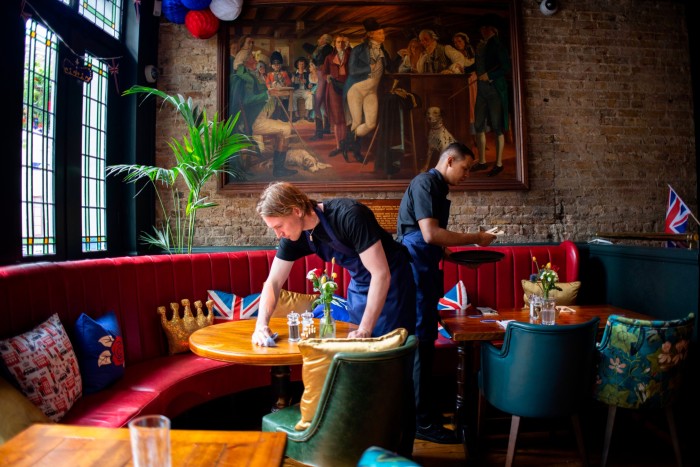 Staff prepare Tesco’s coronation-themed  pub in Farringdon London, for its two-day opening on Thursday and Friday this week