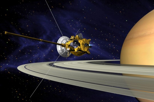 This is an artists concept of Cassini during the Saturn Orbit Insertion (SOI) maneuver, just after the main engine has begun firing.