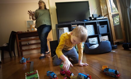 Ronin Lloyd with his mum, Teresa, at home.