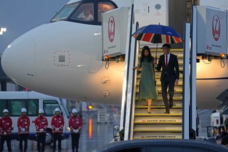 Rishi Sunak and his wife, Akshata Murty, arriving at Hiroshima airport for the G7 summit.