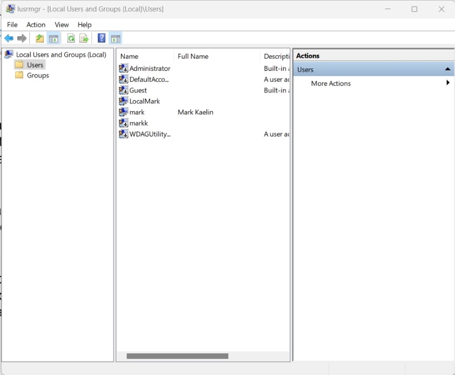 Windows 11 Local Users and Groups manager open with the Users folder selected