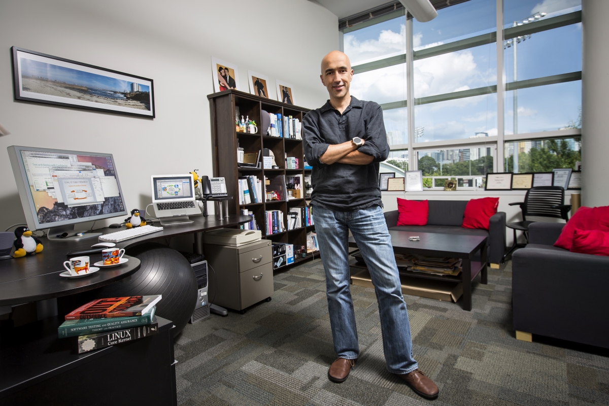 Alex Orso is pictured standing in his office on the Georgia Tech campus. He will assume the role of interim dean of the College of Computing, effective Aug. 1.
