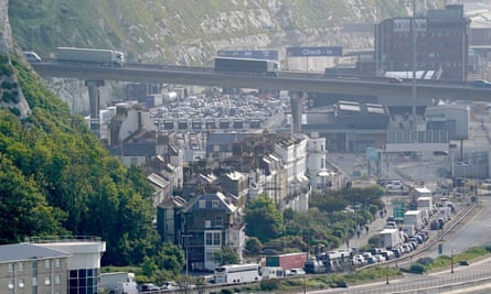 Passengers queue through Dover in Kent.