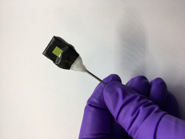 *EMBARGOED UNTIL 16:00 BST, THURS MAY 18 (11:00 ET)* A standalone artificial leaf attached to a metal rod support. The photoanode side (green square) is visible in the photograph. See SWNS story SWSCfuel. A revolutionary new clean fuel has been developed that could see cars being powered by SUNSHINE. The environmentally clean fuel made from the power of the sun has been devised by scientists and could revolutionise motoring. The solar-powered technology converts carbon dioxide and water into liquid fuels that can be directly dropped into a vehicle's engine. The researchers from the University of Cambridge harnessed the power of photosynthesis to convert CO2, water and sunlight into multi-carbon fuels - ethanol and propanol - in a single step.