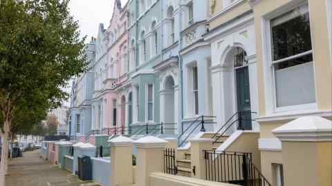 Pastel-coloured terraced houses in the Kensington and Chelsea district of London