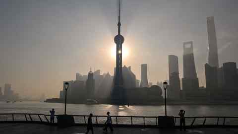 View of the financial district of Lujiazui during sunrise in Shanghai